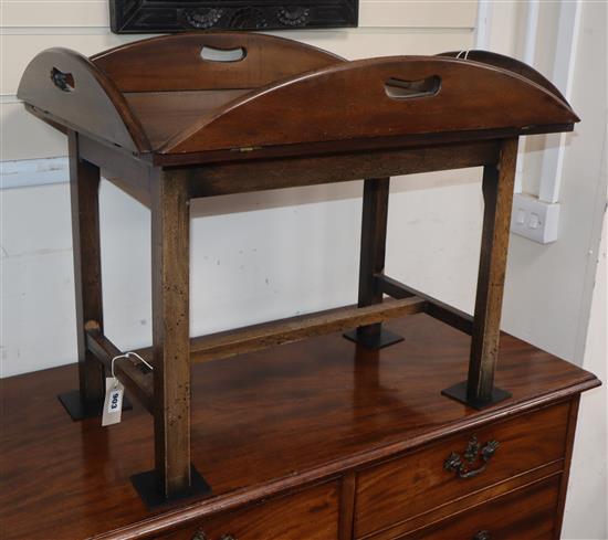 A Georgian style mahogany butlers tray on stand W.71cm